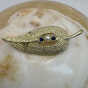 Marcel Boucher signed vintage brooch ith faux pearl and Sapphire blue accents.